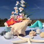 Beach Wedding Table Decorations for Your Gorgeous Summer Wedding Beach Wedding Arches Seashells And Photos Best Beach Wedding