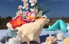 Beach Wedding Table Decorations for Your Gorgeous Summer Wedding Beach Wedding Arches Seashells And Photos Best Beach Wedding