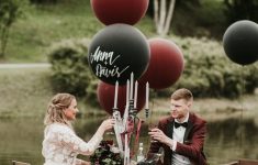 Maroon Wedding Decor 18 A Black Burgundy And Grey Wedding Reception Space With Florals Large Balloons And Candles maroon wedding decor|guidedecor.com