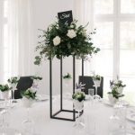 Minimalist Wedding Decor Minimalist Wedding Decor Centerpiece Tall With Greenery And White Roses On Round Table Anna Dymek 334x500 minimalist wedding decor|guidedecor.com