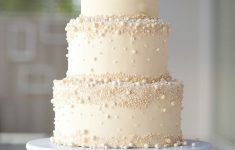 Pearl Wedding Cake Decorations Traditional White Wedding Cake Buttercream And Pearl Details pearl wedding cake decorations|guidedecor.com
