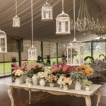 Ventage Wedding Decor Vintage Wedding Decor Eclectic Pitchers And Container After Container Of Lovely Blooms Plus Chandeliers And Birdcages 682x1024 ventage wedding decor|guidedecor.com
