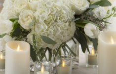 Wedding Decoration With Candles Flameless Candles Wedding Centerpiece 4 923x1024 wedding decoration with candles|guidedecor.com